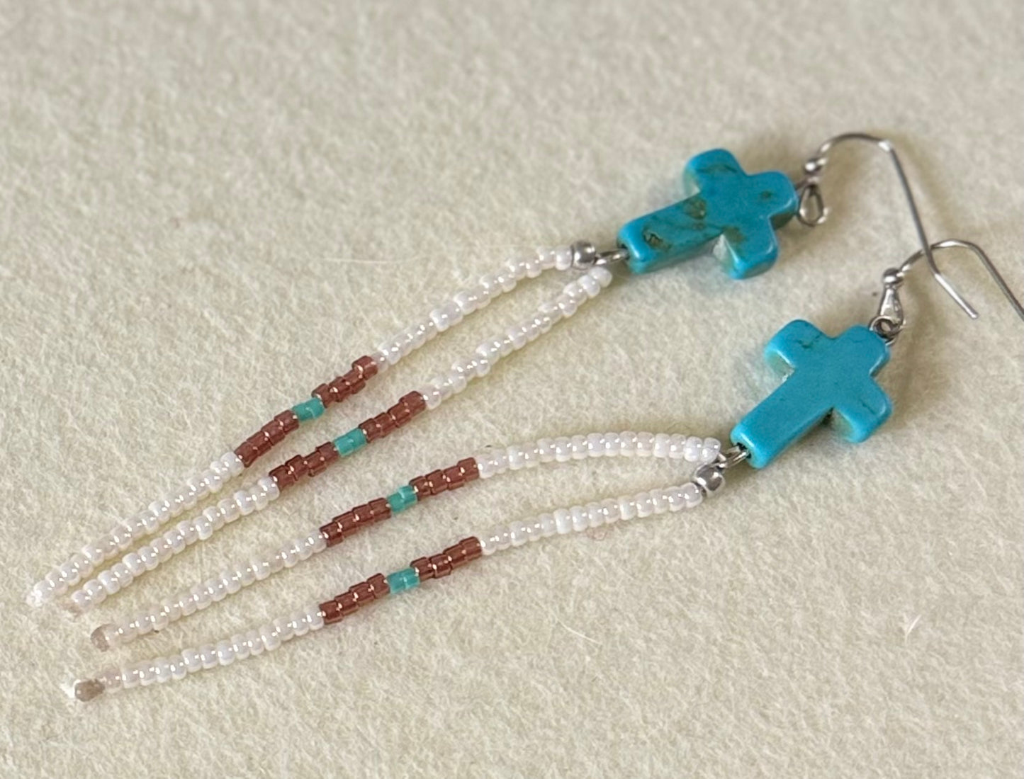 Cross seed bead dangle earrings